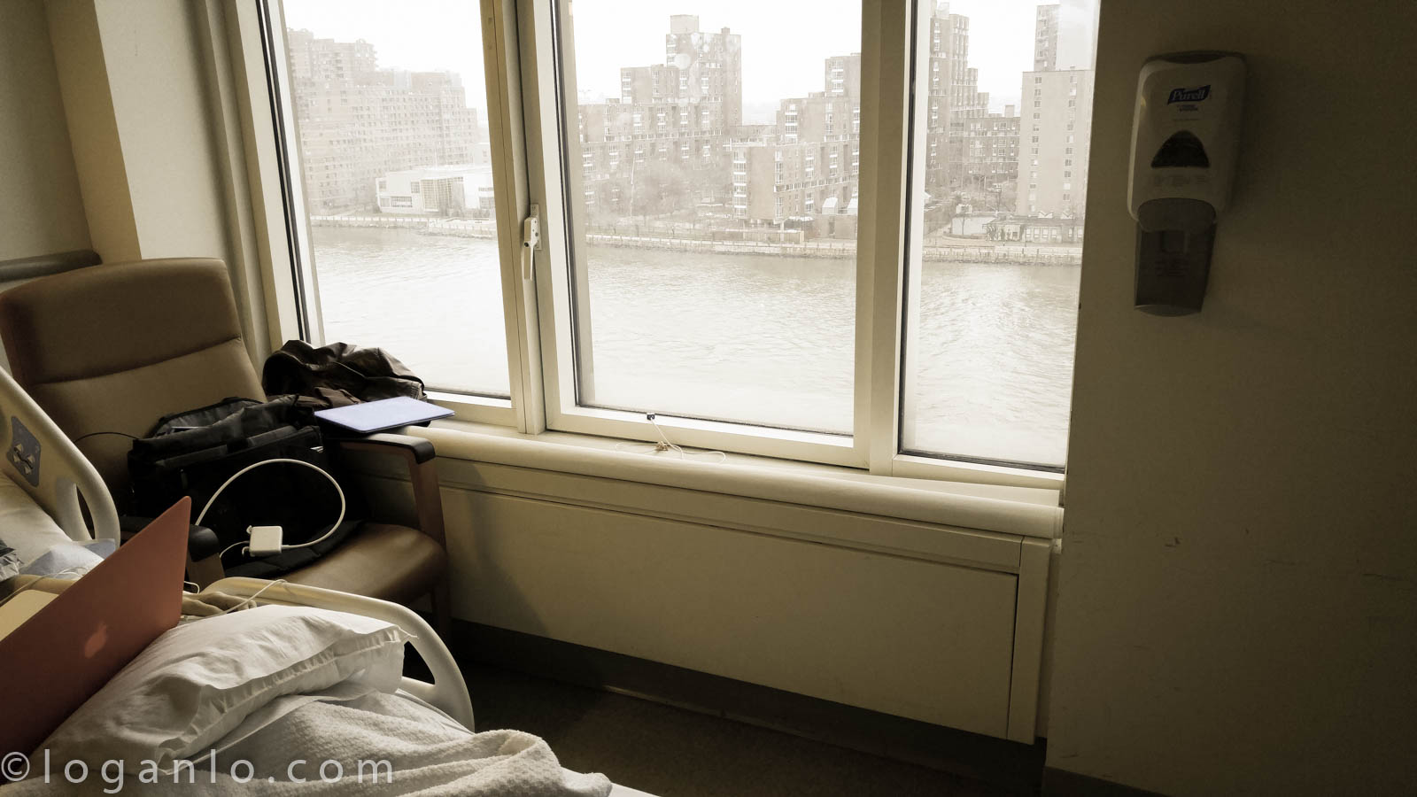 A hospital room looking at the East River