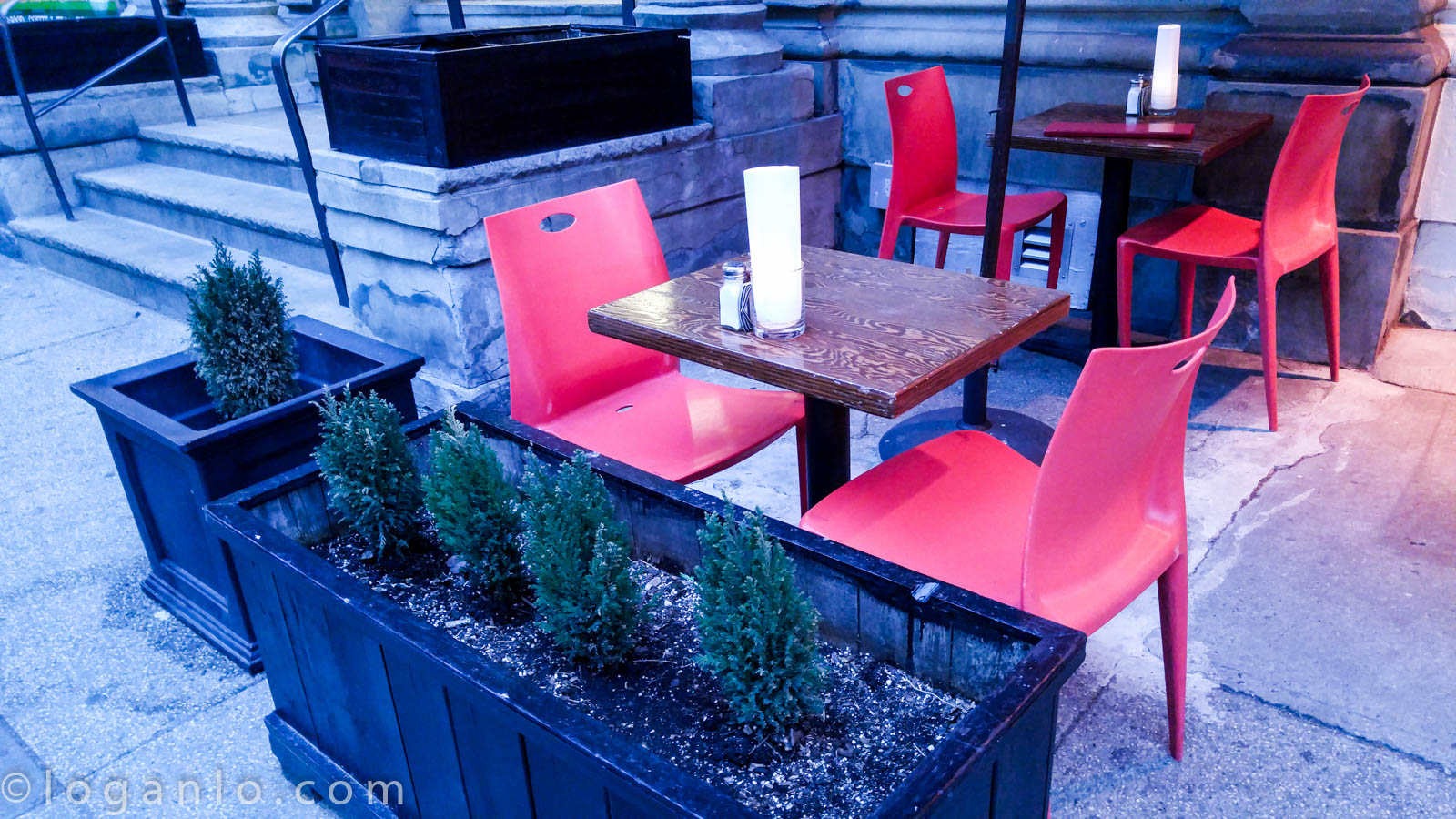 Two empty chairs outside NYC restaurant